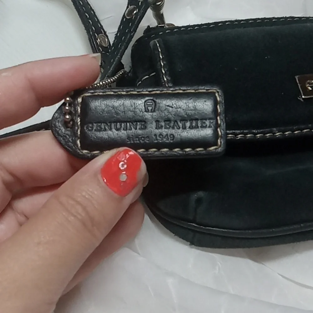 Etienne Aigner black leather wristlet